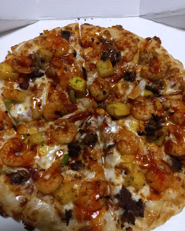 난타 피자의 먹음직스러운 비주얼