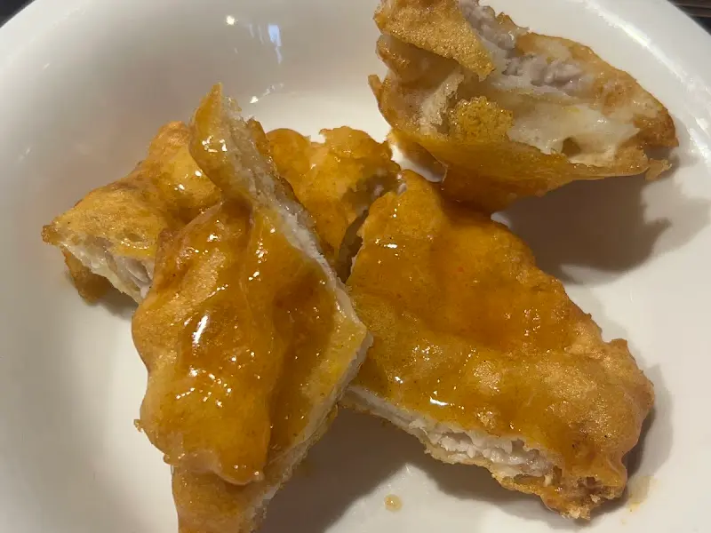 겉은 바삭하고 속은 쫄깃한 탕수육 단면