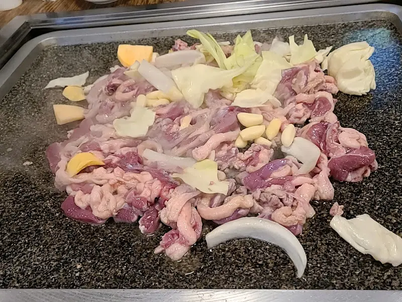 맛있게 익어가는 오리 양념