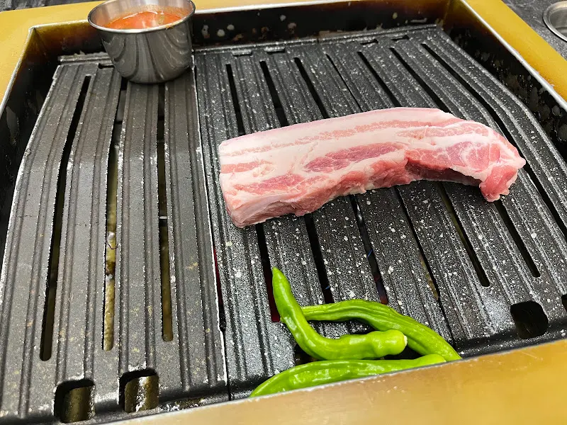 불판 위의 흑돼지