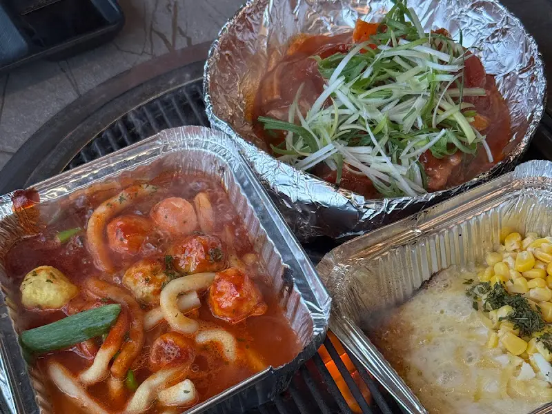 불판 위에서 익어가는 조개