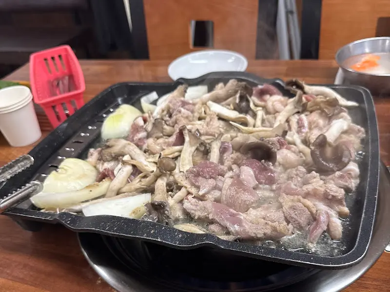 불판 위의 오리 로스구이