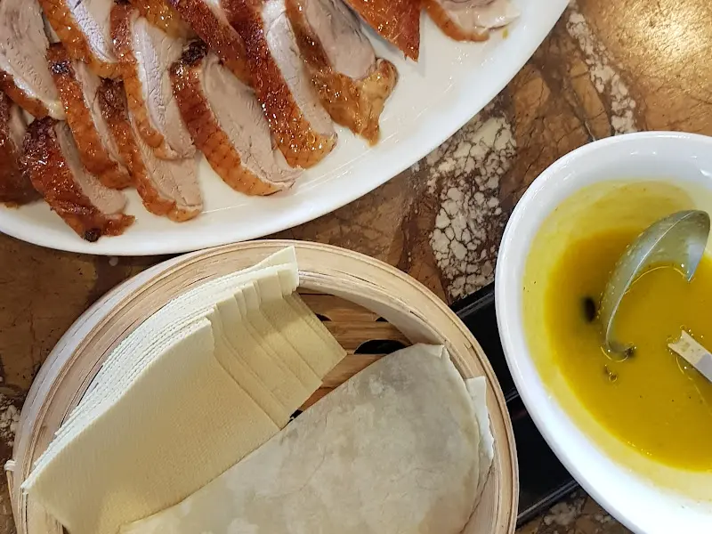 윤기가 흐르는 Conto의 북경 오리 껍질