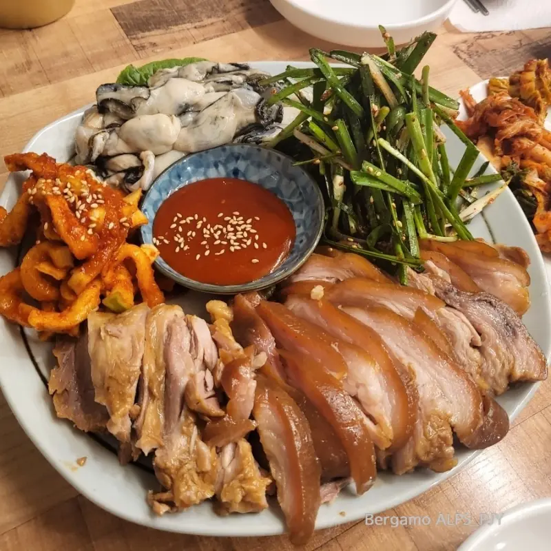 수육, 김치, 굴의 완벽한 조화