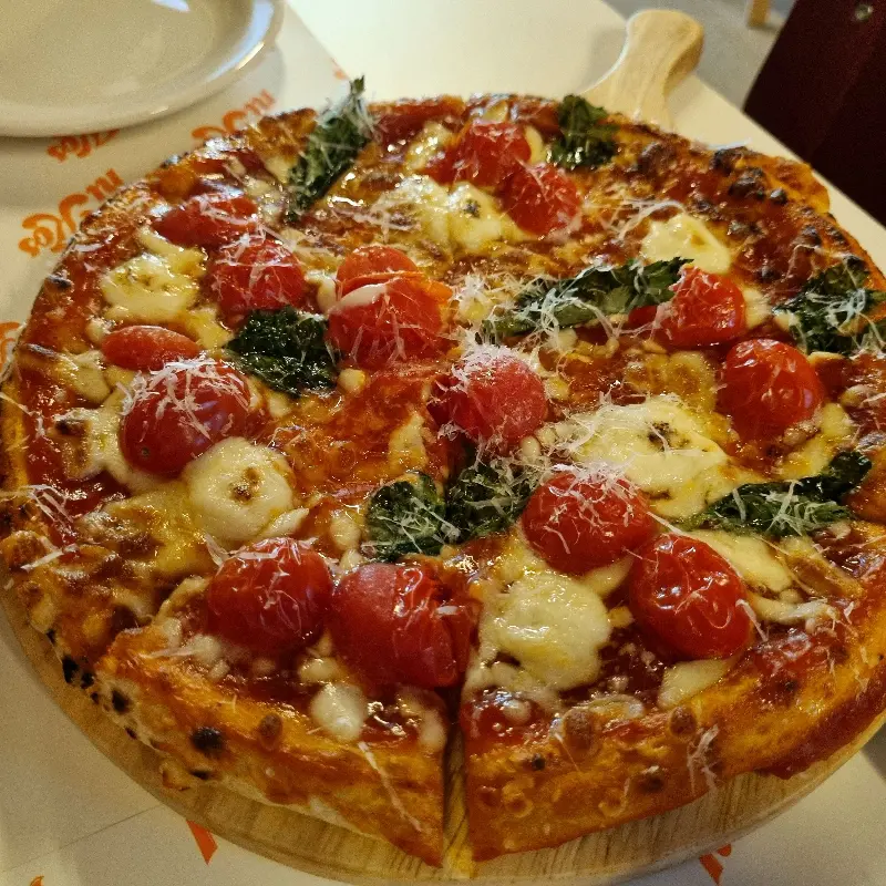 니코스의 시그니처 피자