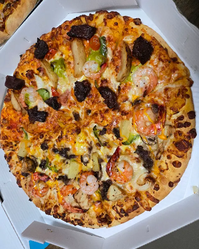 블록버스터4 피자의 풍성한 토핑