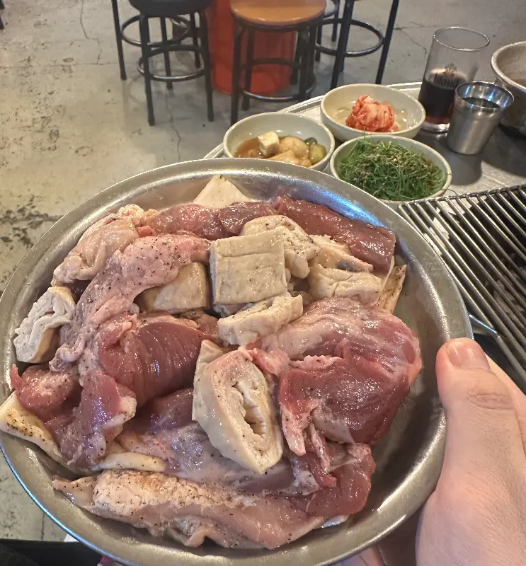 연탄불에 구워지는 고기