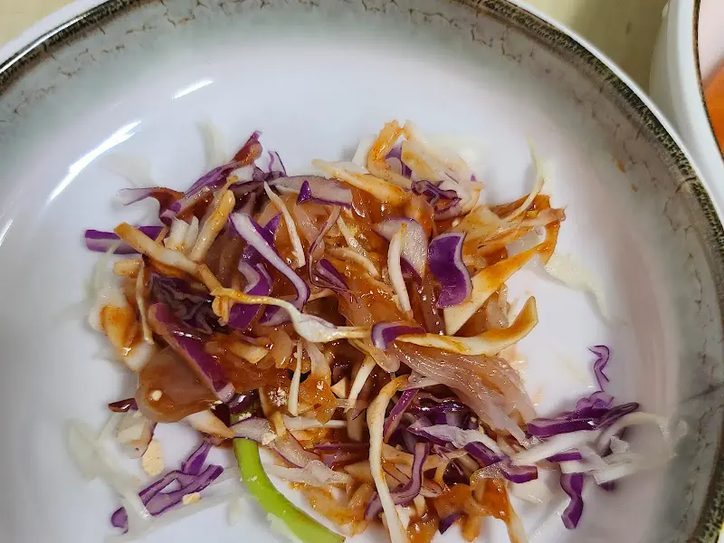 새콤달콤한 초장과 함께 즐기는 산오징어