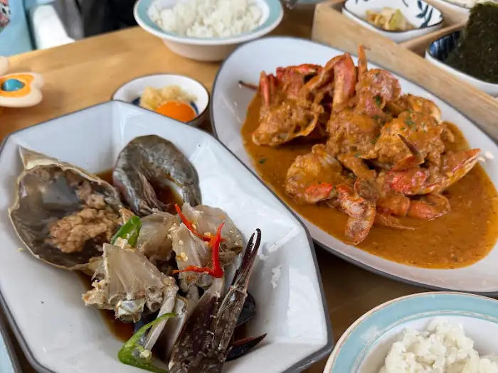 매콤한 소스로 버무려진 칠리크랩 요리