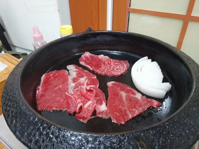 정근식당 고기 굽기
